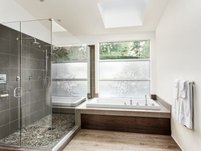 Open Concept Shower with Natural Stone Accents